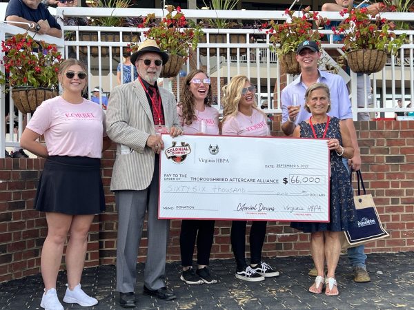 Colonial Downs, Virginia HBPA Present Check to TAA on Virginia Derby Day